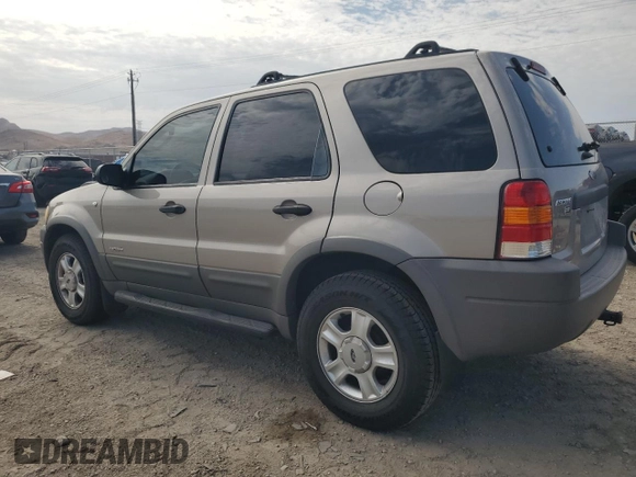 2001 Ford Escape XLT with VIN 1FMCU03131KB27591, listed as a Copart auction lot 66605904 with 167,094 mi miles and Salvage Title. Bid and sale history available at carsss.com. Image 2.