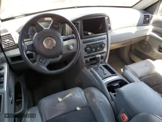 2007 Jeep Grand Cherokee SRT-8 with VIN 1J8HR78387C603473, listed as a Copart auction lot 57712964 with 114,429 mi miles and Salvage Title. Bid and sale history available at carsss.com. Image 8.