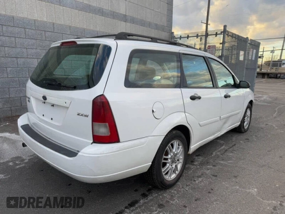 2005 Ford Focus SE with VIN 1FAFP36N65W234695, listed as a Copart auction lot 50022715 with 128,583 mi miles and Clean Title. Bid and sale history available at carsss.com. Image 4.