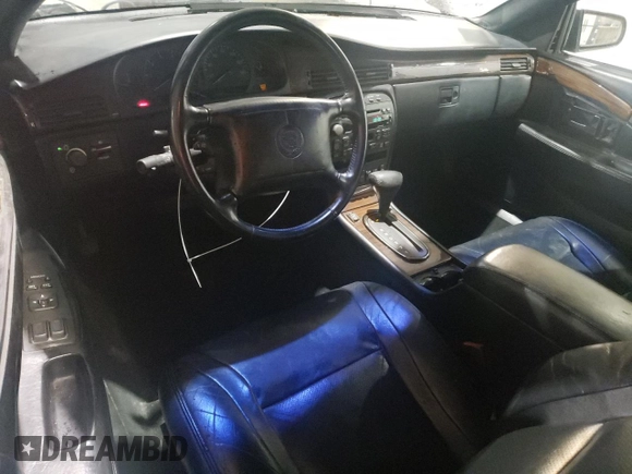 2000 Cadillac Eldorado Touring ETC z VIN 1G6ET1294YU144883, wystawiony jako Copart lot #80979854 z przebiegiem 89 271 mil mil oraz Czysty tytuł • Clean title. Historia ofert i sprzedaży dostępna na DreamBid. Obrazek 8.