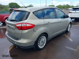 2015 Ford C-Max Hybrid SE with VIN 1FADP5AU5FL120692, listed as a IAAI auction lot 41590616 with 102,381 mi miles. Bid and sale history available at carsss.com. Image 4.
