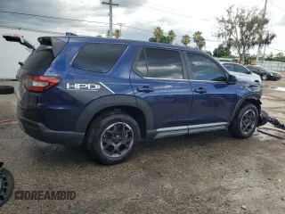 2023 Honda Pilot EX-L 8 Passenger with VIN 5FNYG2H4XPB006479, listed as a Copart auction lot 61258404 with 18,808 mi miles and Salvage Title. Bid and sale history available at carsss.com. Image 3.