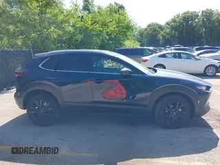 2024 Mazda CX-30 S Select Sport with VIN 3MVDMBBM7RM698178, listed as a IAAI auction lot 42561338 with 25,112 mi miles and . Bid and sale history available at DreamBid. Image 13.
