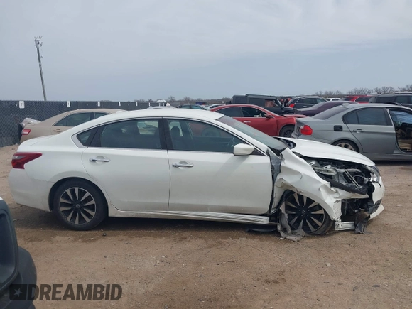 2018 Nissan Altima SV with VIN 1N4AL3AP2JC241377, listed as a IAAI auction lot 41782081 with 131,849 mi miles and . Bid and sale history available at DreamBid. Image 13.