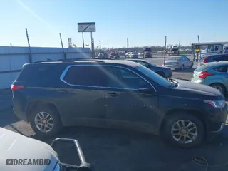 2019 Chevrolet Traverse LT Cloth with VIN 1GNERGKWXKJ264210, listed as a IAAI auction lot 41407627 with 150,393 mi miles. Bid and sale history available at carsss.com. Image 13.