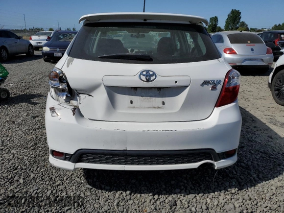 2013 Toyota Matrix S with VIN 2T1KE4EEXDC050325, listed as a Copart auction lot 54090304 with 145,025 mi miles and Salvage title. Bid and sale history available at DreamBid. Image 6.
