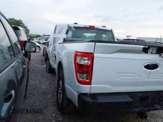 2021 Ford F-150 XL with VIN 1FTMF1CB5MKE25341, listed as a IAAI auction lot 42103478 with 125,369 mi miles and . Bid and sale history available at DreamBid. Image 3.