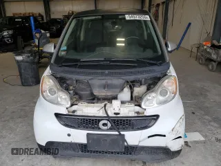2013 Smart fortwo Pure с VIN WMEEJ3BA9DK626037, выставлен на аукционе Copart как лот 54573255 с пробегом 66 070 миль миль и Чистый • Clean title. История ставок и продаж доступна на DreamBid. Изображение 5.