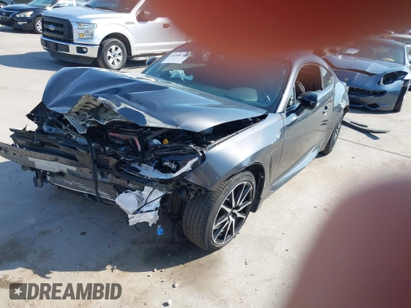 2023 Toyota 86 z VIN JF1ZNBB11P9765420, wystawiony jako IAAI lot #40588704 z przebiegiem Nie podano mil oraz . Historia ofert i sprzedaży dostępna na DreamBid. Obrazek 17.