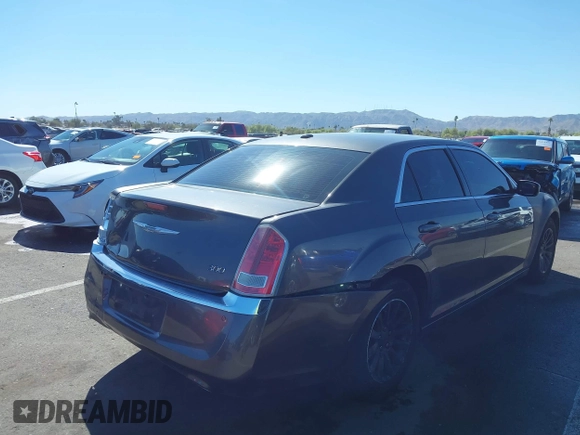2014 Chrysler 300 with VIN 2C3CCAAG1EH191375, listed as a IAAI auction lot 41867688 with 218,740 mi miles. Bid and sale history available at carsss.com. Image 4.
