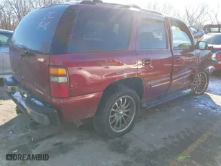 2002 Chevrolet Tahoe LT with VIN 1GNEK13Z82J299497, listed as a IAAI auction lot 41304388 with 146,007 mi miles. Bid and sale history available at carsss.com. Image 4.
