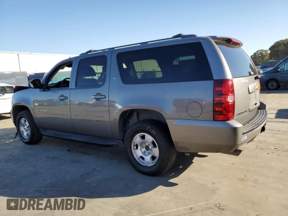 2009 Chevrolet Suburban LT w/2LT with VIN 1GNFK26359J119663, listed as a Copart auction lot 73777444 with 180,851 mi miles and Salvage Title. Bid and sale history available at carsss.com. Image 2.