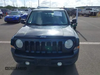 2014 Jeep Patriot Latitude with VIN 1C4NJPFA9ED679293, listed as a IAAI auction lot 42078681 with 94,124 mi miles and . Bid and sale history available at DreamBid. Image 6.