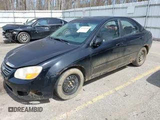 2009 Kia Spectra EX with VIN KNAFE221X95653719, listed as a IAAI auction lot 41945349 with 239,878 mi miles. Bid and sale history available at carsss.com. Image 2.