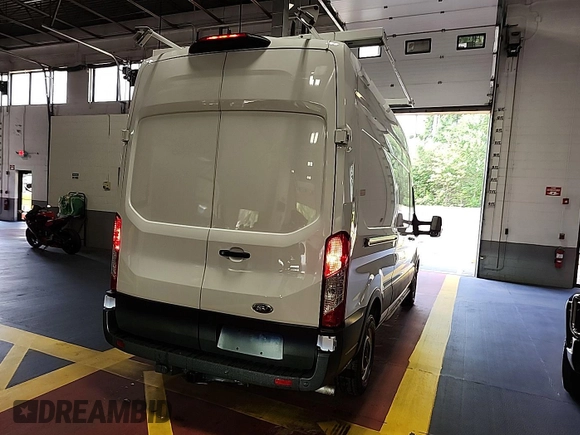 2023 Ford Transit Cargo z VIN 1FTBR1X85PKC00581, wystawiony jako IAAI lot #42900680 z przebiegiem 8 386 mil mil oraz . Historia ofert i sprzedaży dostępna na DreamBid. Obrazek 24.