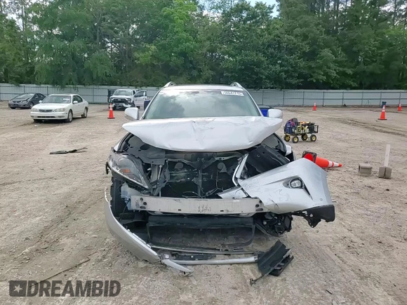 2015 Lexus RX 350 with VIN 2T2BK1BA9FC302248, listed as a Copart auction lot 56641715 with 124,761 mi miles and Salvage title. Bid and sale history available at DreamBid. Image 14.