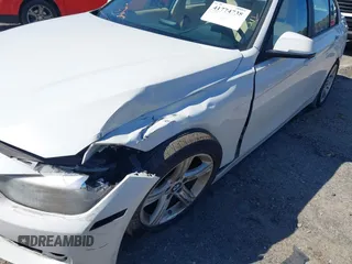 2014 BMW 3 Series 320i with VIN WBA3B1C59EP678908, listed as a IAAI auction lot 41774738 with 143,975 mi miles. Bid and sale history available at carsss.com. Image 6.