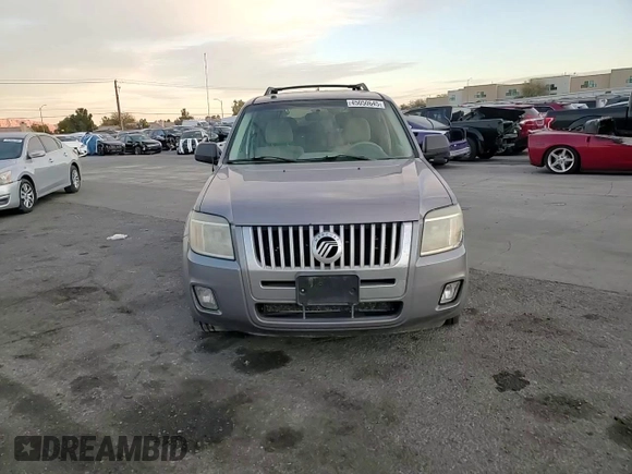 2008 Mercury Mariner z VIN 4M2CU91168KJ36995, wystawiony jako Copart lot #45050645 z przebiegiem 220 645 mil mil oraz Szkoda całkowita • Salvage title. Historia ofert i sprzedaży dostępna na DreamBid. Obrazek 11.