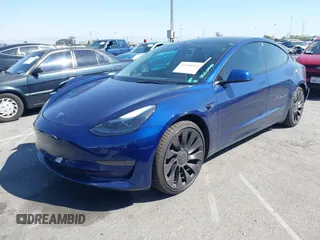 2022 Tesla Model 3 Performance with VIN 5YJ3E1EC5NF315764, listed as a IAAI auction lot 41760552 with 22,354 mi miles and . Bid and sale history available at carsss.com. Image 2.