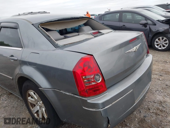 2006 Chrysler 300 Touring with VIN 2C3KA53G56H224403, listed as a IAAI auction lot 42042832 with 137,764 mi miles and . Bid and sale history available at DreamBid. Image 18.