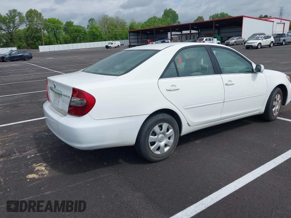2004 Toyota Camry LE with VIN 4T1BE32K64U277496, listed as a IAAI auction lot 42130199 with 250,972 mi miles. Bid and sale history available at carsss.com. Image 4.