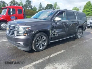 2015 Chevrolet Suburban LTZ with VIN 1GNSKKKC4FR589913, listed as a IAAI auction lot 42017190 with 216,145 mi miles. Bid and sale history available at carsss.com. Image 17.