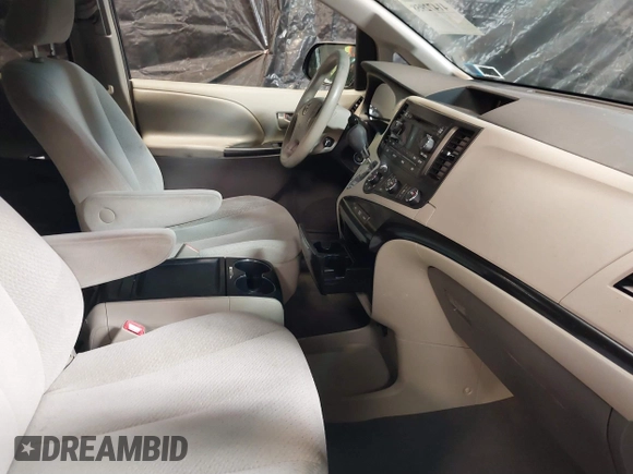 2011 Toyota Sienna LE AAS z VIN 5TDKK3DC2BS025698, wystawiony jako IAAI lot #41472958 z przebiegiem 150 699 mil mil oraz . Historia ofert i sprzedaży dostępna na DreamBid. Obrazek 5.