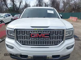 2017 GMC Sierra 1500 Denali with VIN 3GTU2PEC2HG438632, listed as a IAAI auction lot 41838632 with 80,319 mi miles and . Bid and sale history available at DreamBid. Image 12.