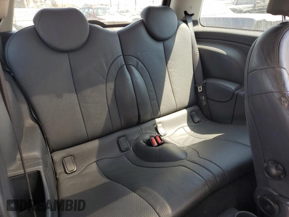 2003 MINI Hardtop with VIN WMWRC33453TE14909, listed as a Copart auction lot 65419725 with 111,960 mi miles and Salvage title. Bid and sale history available at DreamBid. Image 10.