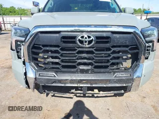 2022 Toyota Tundra SR5 with VIN 5TFLA5AB7NX013477, listed as a IAAI auction lot 42172272 with 30,460 mi miles and . Bid and sale history available at DreamBid. Image 6.