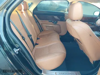 2018 Jaguar XJ with VIN SAJWJ2GD3J8W15092, listed as a IAAI auction lot 41844106 with 56,357 mi miles. Bid and sale history available at carsss.com. Image 8.