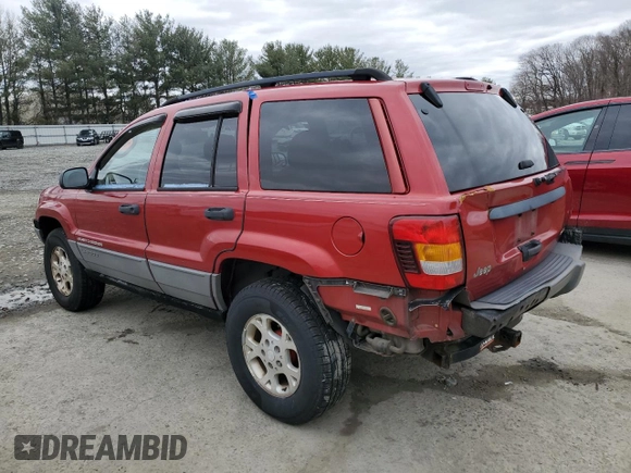 2002 Jeep Grand Cherokee with VIN 1J8GX38S92C176329, listed as a Copart auction lot 47885635 with 154,167 mi miles and Salvage title. Bid and sale history available at DreamBid. Image 2.