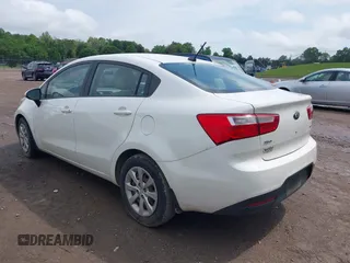 2013 Kia Rio LX with VIN KNADM4A39D6318169, listed as a IAAI auction lot 42063285 with 138,272 mi miles and . Bid and sale history available at DreamBid. Image 3.