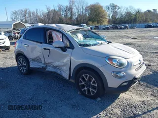 2016 FIAT 500X Trekking z VIN ZFBCFXCT6GP367385, wystawiony jako IAAI lot #41237102 z przebiegiem 158 383 mil mil oraz . Historia ofert i sprzedaży dostępna na DreamBid. Obrazek 1.