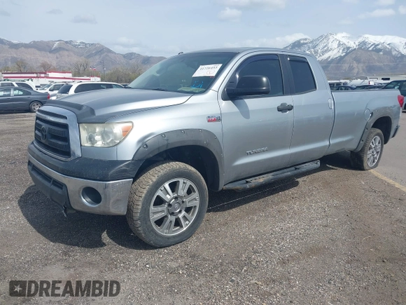 2012 Toyota Tundra 4WD Truck SR with VIN 5TFCW5F19CX012832, listed as a IAAI auction lot 41726453 with 232,078 mi miles. Bid and sale history available at carsss.com. Image 17.