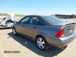 2003 Ford Focus ZTS with VIN 1FAFP38353W178144, listed as a IAAI auction lot 42039418 with 156,709 mi miles and . Bid and sale history available at carsss.com. Image 3.