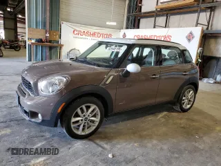 2012 MINI Countryman S with VIN WMWZC5C56CWL61976, listed as a Copart auction lot 62948195 with 122,507 mi miles and Clean title. Bid and sale history available at DreamBid. Image 1.