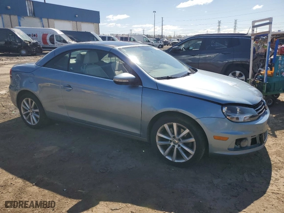 2014 Volkswagen Eos Komfort with VIN WVWBW8AH5EV004209, listed as a Copart auction lot 52424035 with 151,610 mi miles and Clean Title. Bid and sale history available at carsss.com. Image 4.