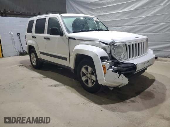 2012 Jeep Liberty Sport with VIN 1C4PJLAK5CW127485, listed as a Copart auction lot 48242425 with 139,273 mi miles and Salvage Title. Bid and sale history available at DreamBid. Image 4.