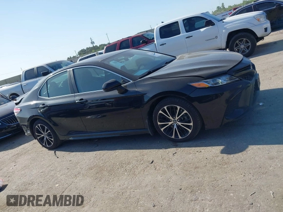 2019 Toyota Camry LE z VIN 4T1B11HK5KU746677, wystawiony jako IAAI lot #41968272 z przebiegiem 78 064 mil mil oraz . Historia ofert i sprzedaży dostępna na DreamBid. Obrazek 13.