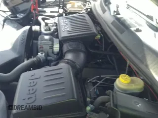 2003 Jeep Grand Cherokee Laredo z VIN 1J4GW48N1YC109592, wystawiony jako IAAI lot #35052235 z przebiegiem 167 712 mil mil oraz . Historia ofert i sprzedaży dostępna na DreamBid. Obrazek 12.