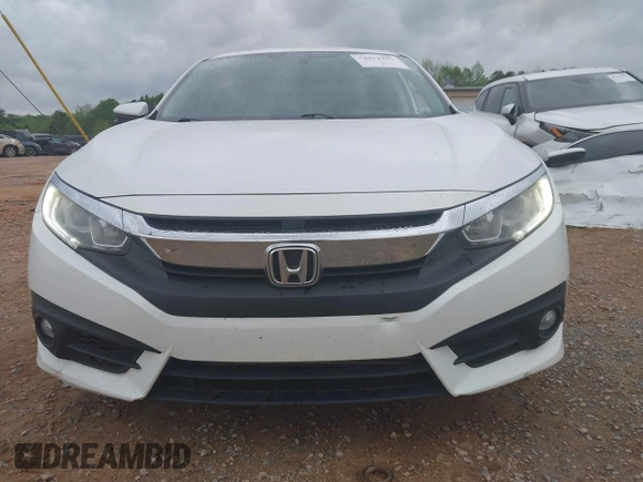 2017 Honda Civic EX-L with VIN 2HGFC1F72HH658763, listed as a IAAI auction lot 41972317 with 166,168 mi miles and . Bid and sale history available at DreamBid. Image 13.