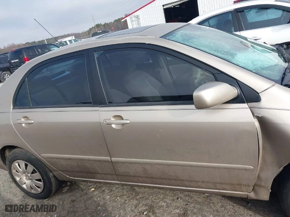 2004 Toyota Corolla CE with VIN 2T1BR38E74C197003, listed as a IAAI auction lot 41465793 with 218,602 mi miles. Bid and sale history available at carsss.com. Image 14.