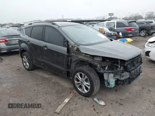 2017 Ford Escape SE z VIN 1FMCU0GD7HUA61159, wystawiony jako IAAI lot #41543055 z przebiegiem 130 471 mil mil oraz . Historia ofert i sprzedaży dostępna na DreamBid. Obrazek 1.