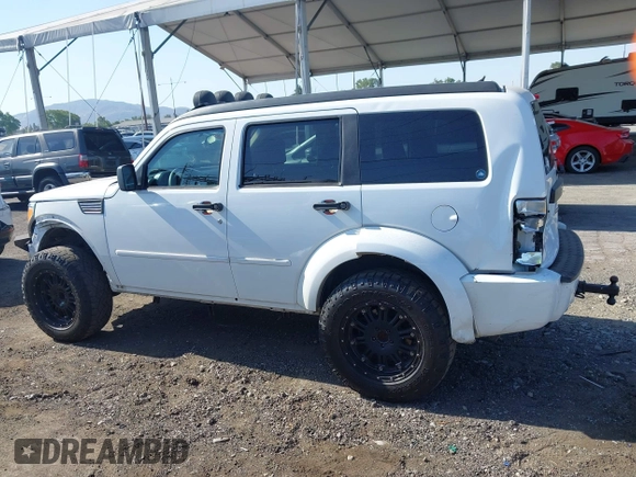 2011 Dodge Nitro Heat with VIN 1D4PT4GK9BW596989, listed as a IAAI auction lot 42397427 with 158,609 mi miles and . Bid and sale history available at DreamBid. Image 14.