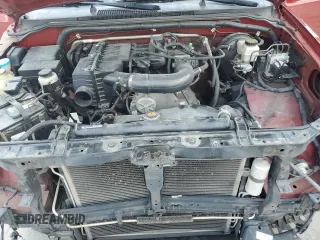 2015 Nissan Frontier S with VIN 1N6BD0CT8FN738169, listed as a Copart auction lot 63712315 with 165,061 mi miles and Salvage title. Bid and sale history available at DreamBid. Image 11.
