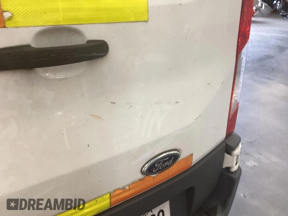 2016 Ford Transit Cargo z VIN 1FTYE1YM5GKB48743, wystawiony jako IAAI lot #42849622 z przebiegiem 200 188 mil mil oraz . Historia ofert i sprzedaży dostępna na DreamBid. Obrazek 16.