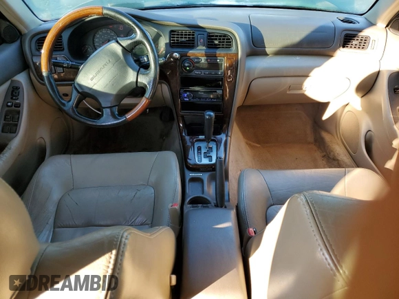 2001 Subaru Legacy Outback VDC with VIN 4S3BH896517651821, listed as a Copart auction lot 79705664 with 203,619 mi miles and Salvage title. Bid and sale history available at DreamBid. Image 8.
