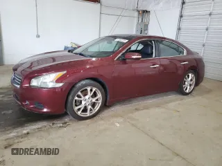 2012 Nissan Maxima SV with VIN 1N4AA5AP8CC806980, listed as a Copart auction lot 57969135 with 114,028 mi miles and Salvage title. Bid and sale history available at DreamBid. Image 1.