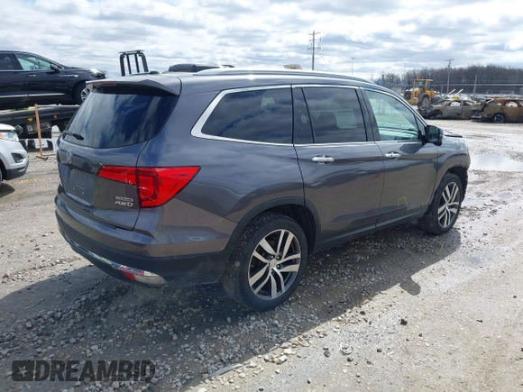 2017 Honda Pilot Touring with VIN 5FNYF6H92HB036406, listed as a IAAI auction lot 41949223 with 147,462 mi miles. Bid and sale history available at carsss.com. Image 4.
